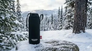 Insulated neoprene sleeve covering a water bottle.