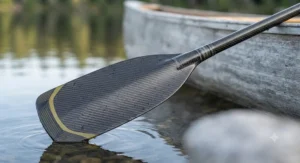 Close-up view showing the reinforced tip and shaft of a high-performance lightweight canoe paddle designed for long trips.