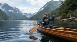 A canoeist using a comfortable lightweight canoe paddle to navigate through British Columbia coastal waters.