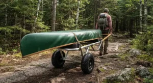 A high-stability canoe cart for portaging designed for long-distance treks across rugged Canadian portage routes.